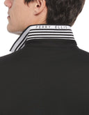 Polo Negro con Tecnología Moisture Wicking y Cuello Tejido
