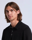 Suéter polo de manga larga con tejido jacquard y 3 botones