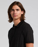 Suéter polo de algodón y modal con jacquard de cuadrícula