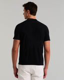 Suéter polo de manga corta con tejido jacquard y cuello abierto