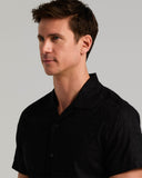 Camisa de manga corta con cuello camp y tejido jacquard