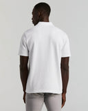 Polo de manga corta con botones y textura jacquard geométrica