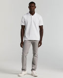 Polo de manga corta con botones y textura jacquard geométrica
