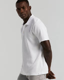 Polo de manga corta con botones y textura jacquard geométrica