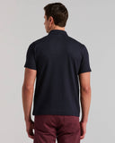 Polo de manga corta con botones y textura jacquard geométrica