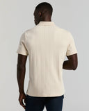 Polo de manga corta con cierre 1/4 y textura Drop Needle