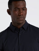 Camisa Slim Fit Azul Marino de Manga Larga con Tejido Dobby Stretch y Cuello Expandible